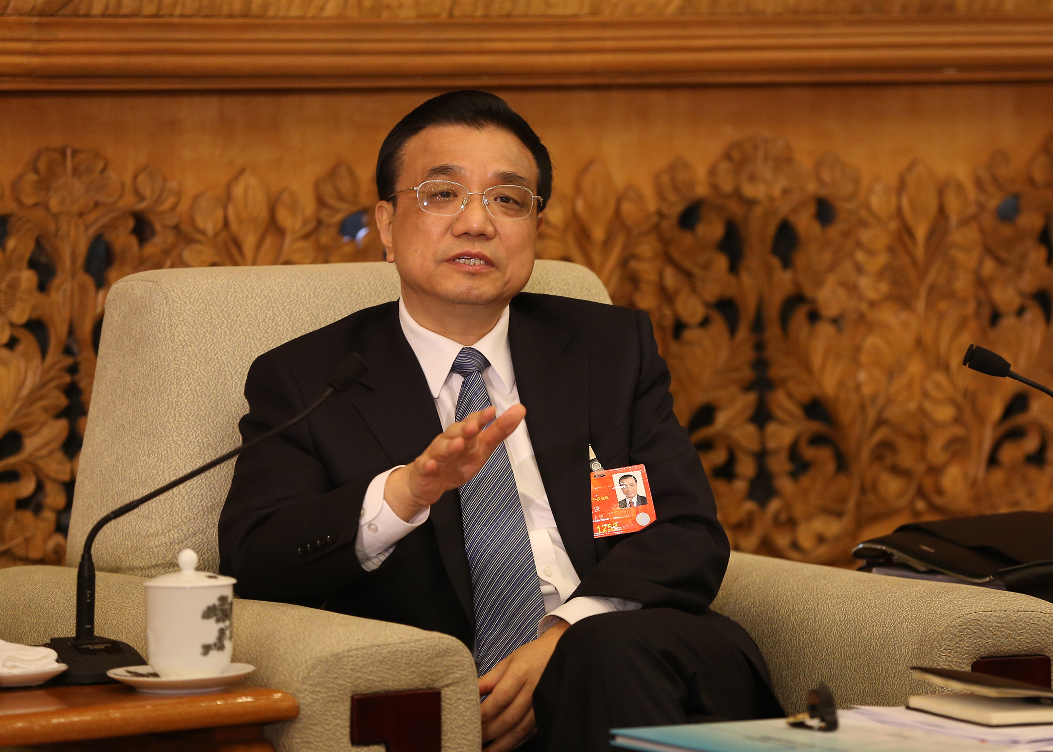 李克强要求贵州坚定与全国同步全面建成小康社会的决心，在跨越发展中实现转型发展