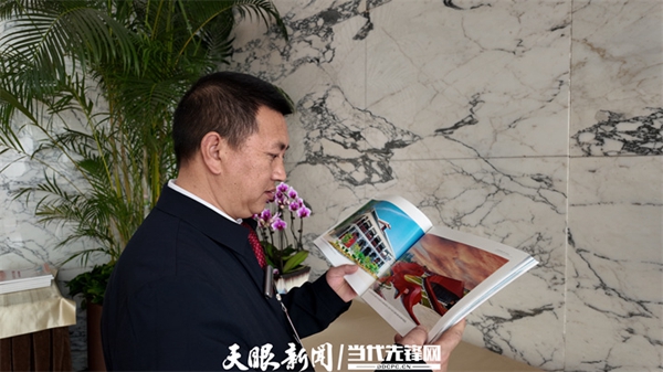 鞠华国代表：让老百姓吃上红色旅游饭